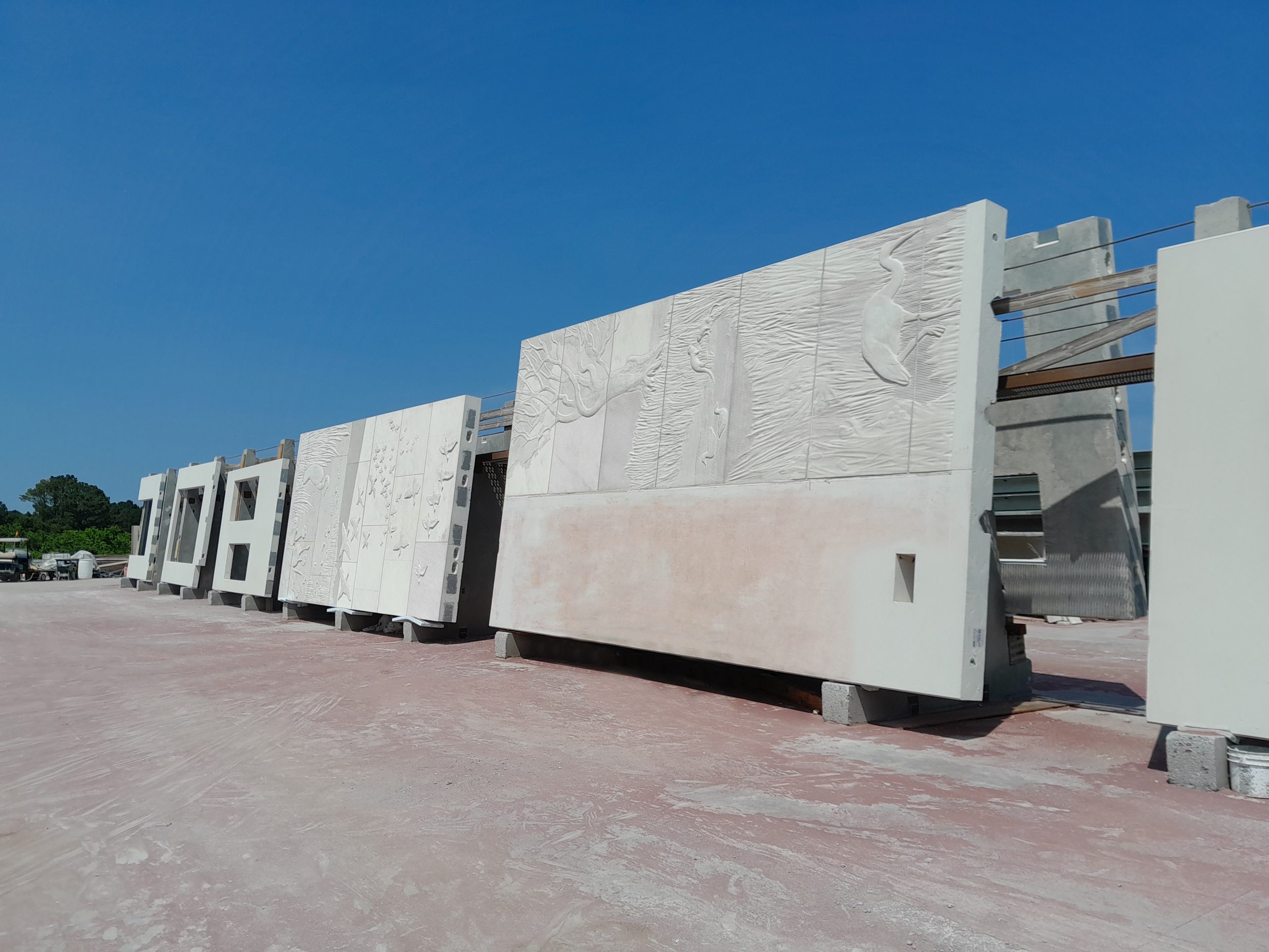 Precast wall panel colored white